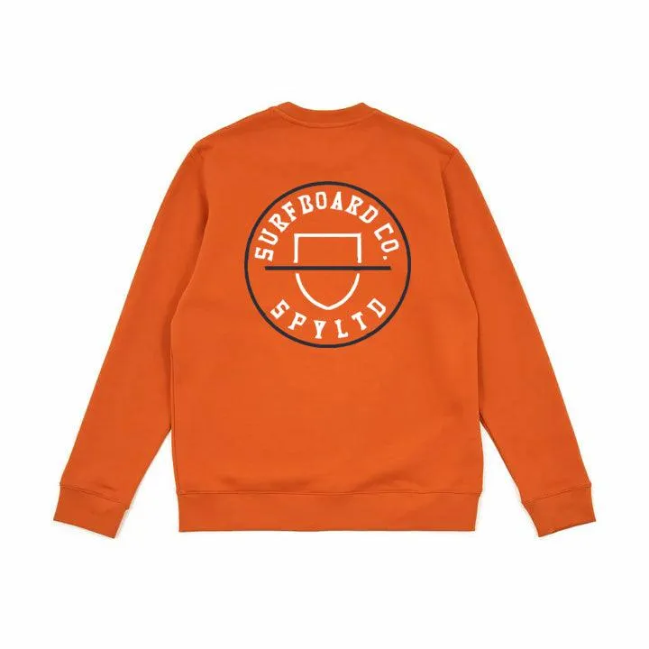 Buzo Spy Escudo Crew Naranja Marrón