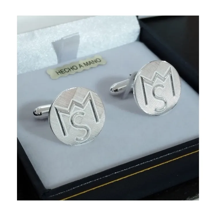 Gemelos Escudo ganadería en relieve en plata de ley